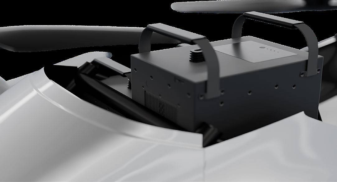 A battery module clipped into the top of the aircraft