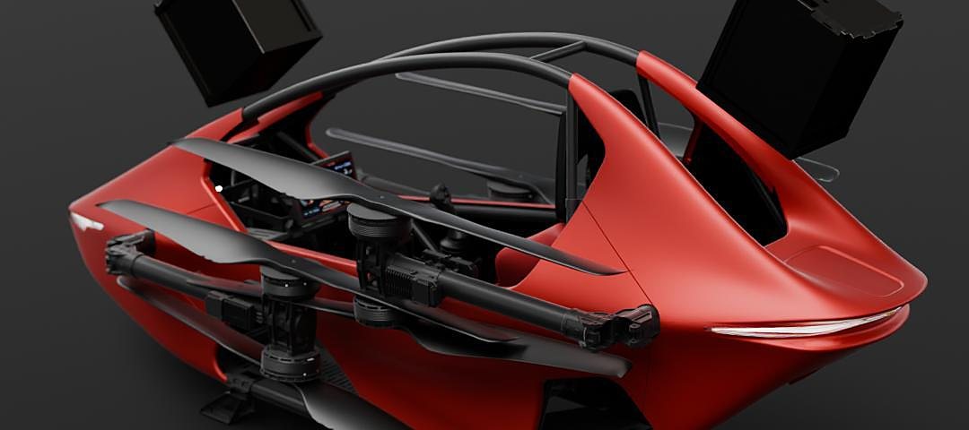 The one-piece titanium roll cage of a red S-ZERO, motors folded in