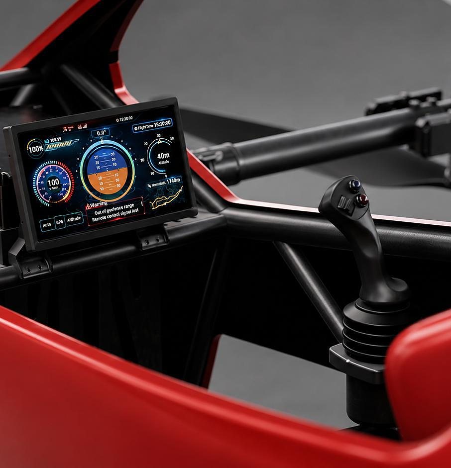 Inside the S-ZERO cockpit: the red cage, a single joystick and the flight display
